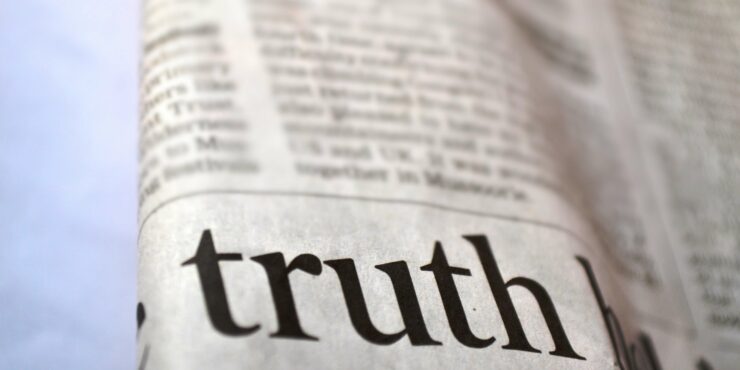 Photo of newspaper with word truth